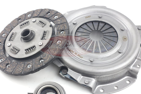 Clutch kit with clutch disc and pressure plate on a white background