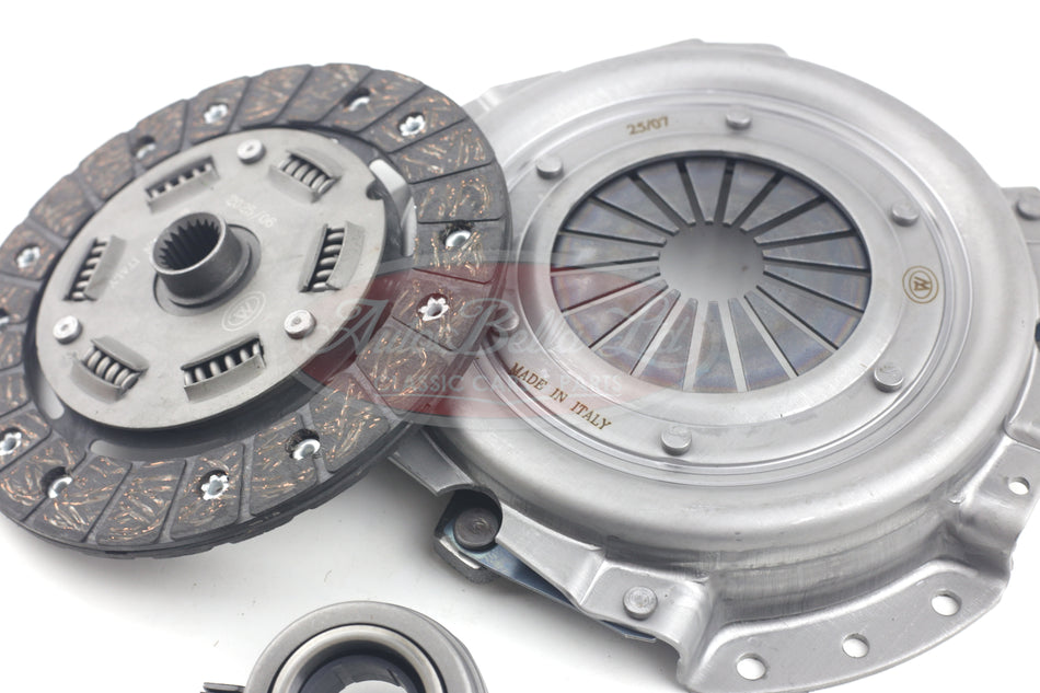 Clutch kit with clutch disc and pressure plate on a white background