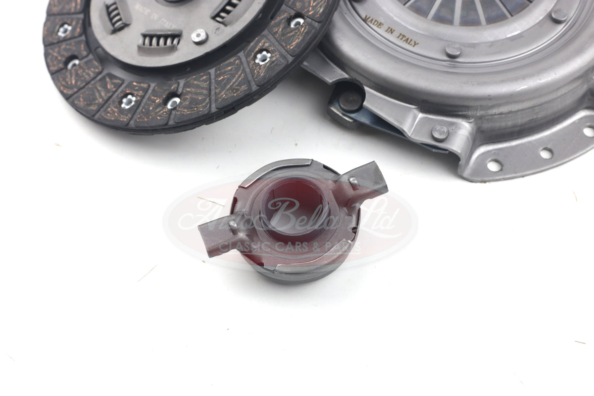 Clutch plate, disc and bearing on white background