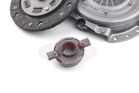 Clutch plate, disc and bearing on white background